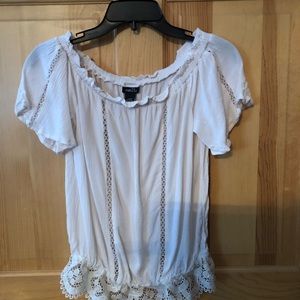 Cream colored top with Lacey accents